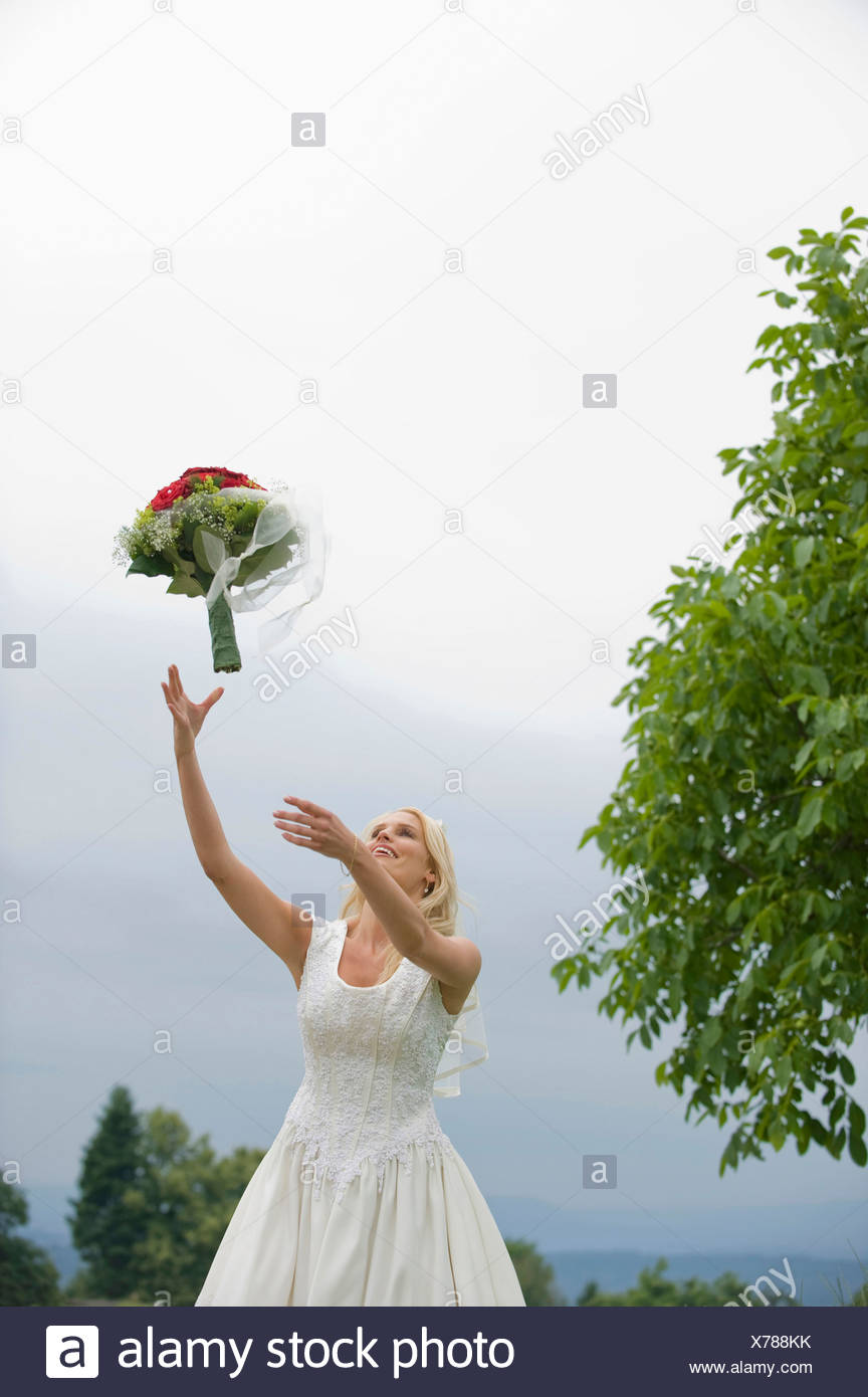 Throwing Flowers Up High Resolution Stock Photography And Images Alamy