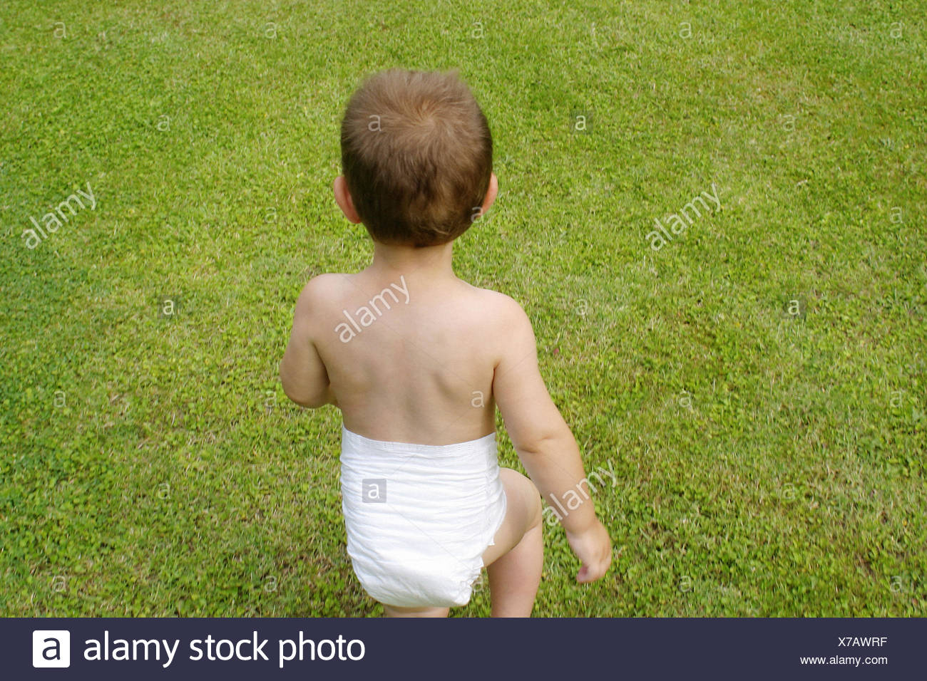Baby In Diaper Walking Stock Photos & Baby In Diaper Walking Stock