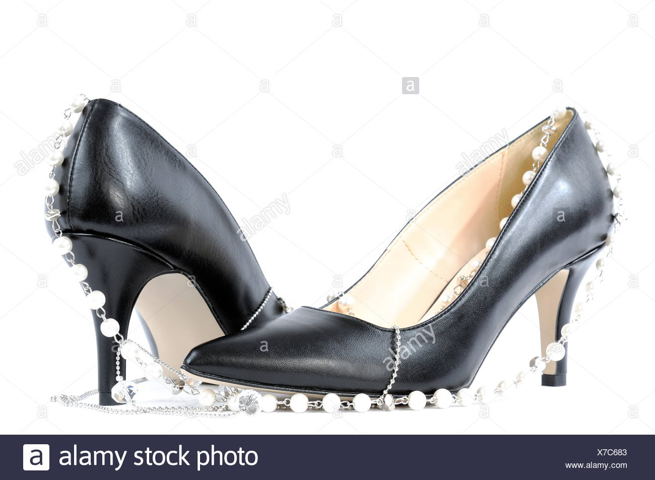 black shoes with pearls on them