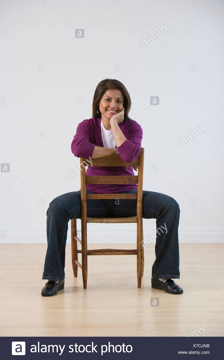 Sitting Chair Backwards Stock Photos & Sitting Chair Backwards Stock