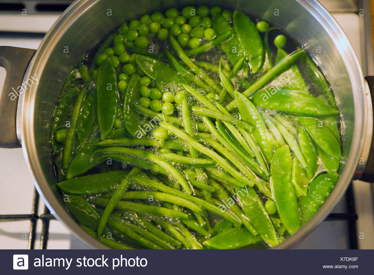 green vegetables cooking in boiling water Stock Photo 279968935 Alamy