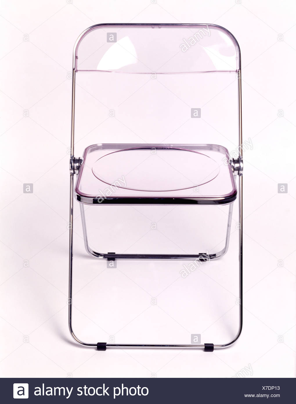 Close Up Of Clear Plastic Plia Chair Designed By Giancarlo