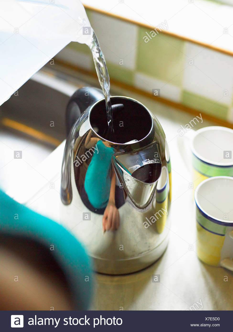 Filling Kettle With Water High Resolution Stock Photography and Images