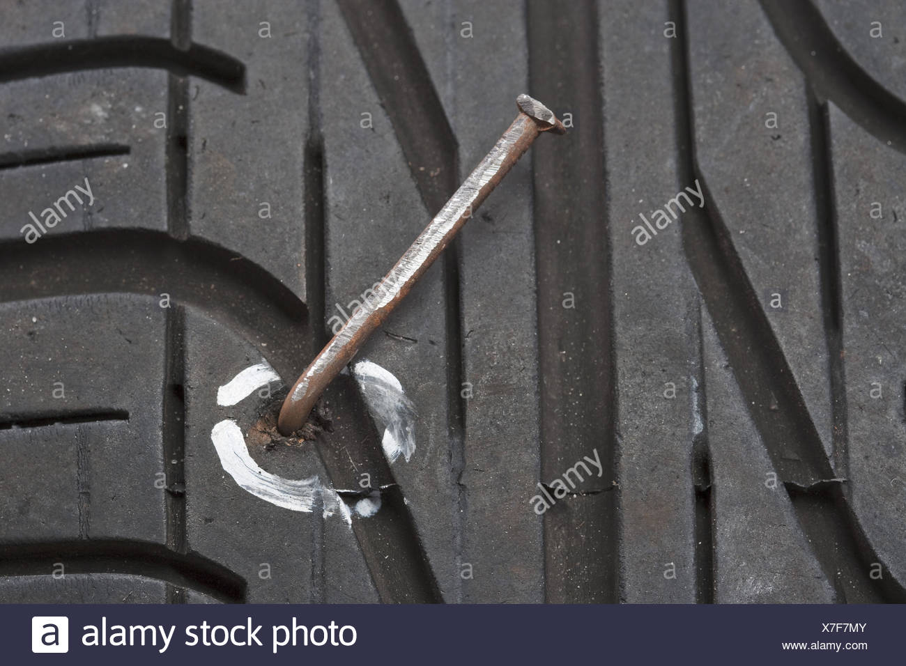 Tyre Puncture Nail In Tyre Stock Photos & Tyre Puncture Nail In Tyre Stock Images Alamy