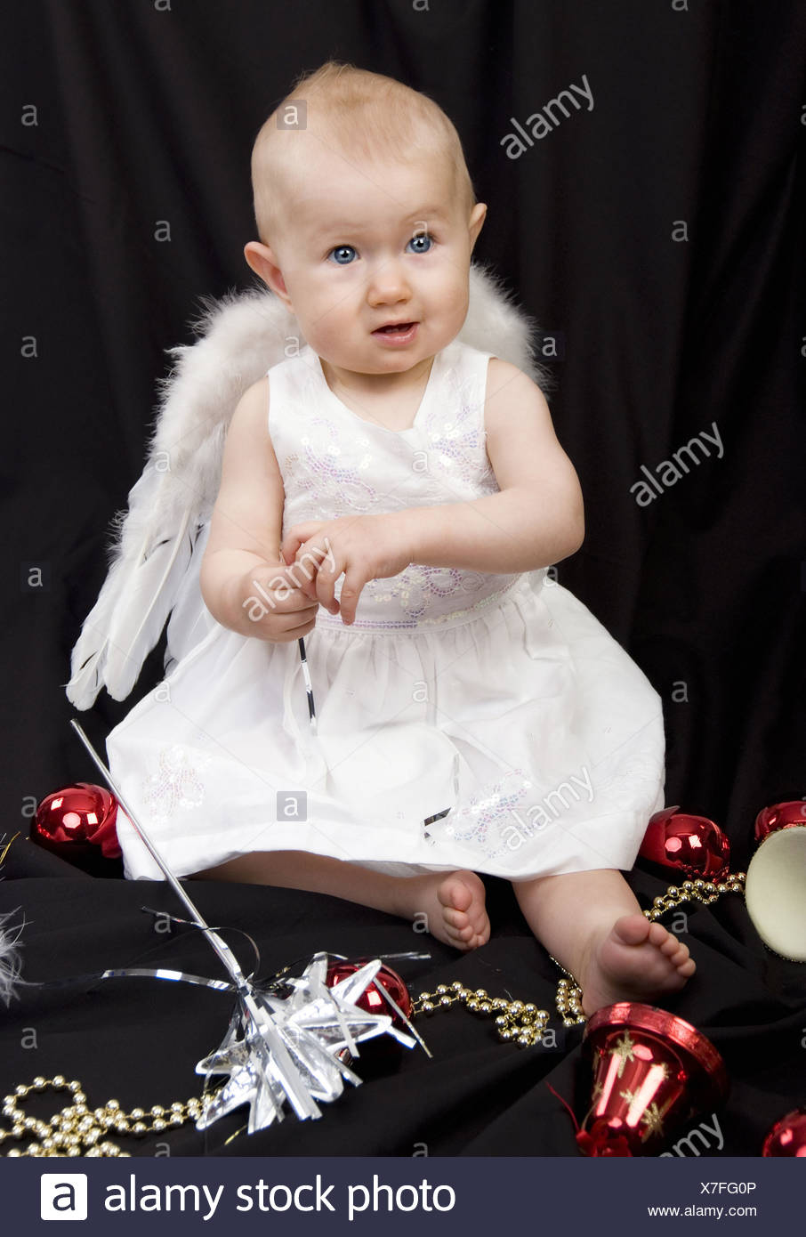Angel Holding Baby Stock Photos & Angel Holding Baby Stock Images Alamy