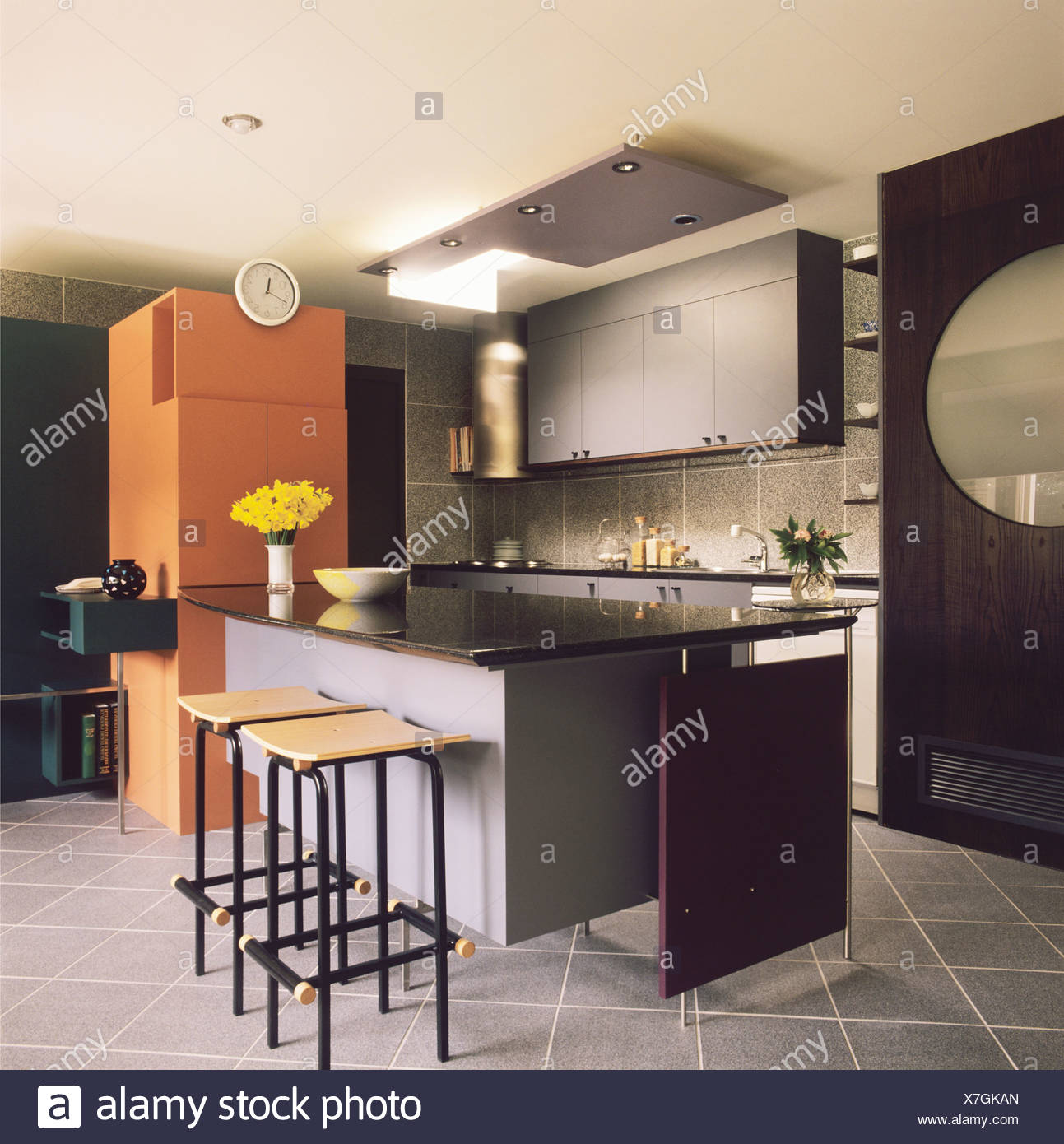 Metal Stools At Breakfast Bar On Black White Island Unit In
