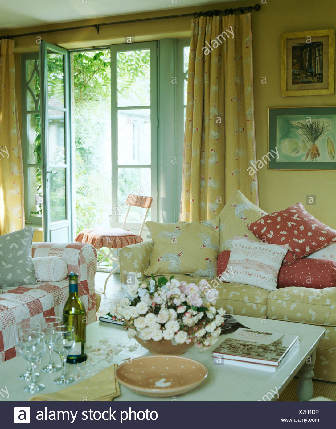 Cream Patterned Vanessa Arbuthnot Sofa With Matching Curtains On