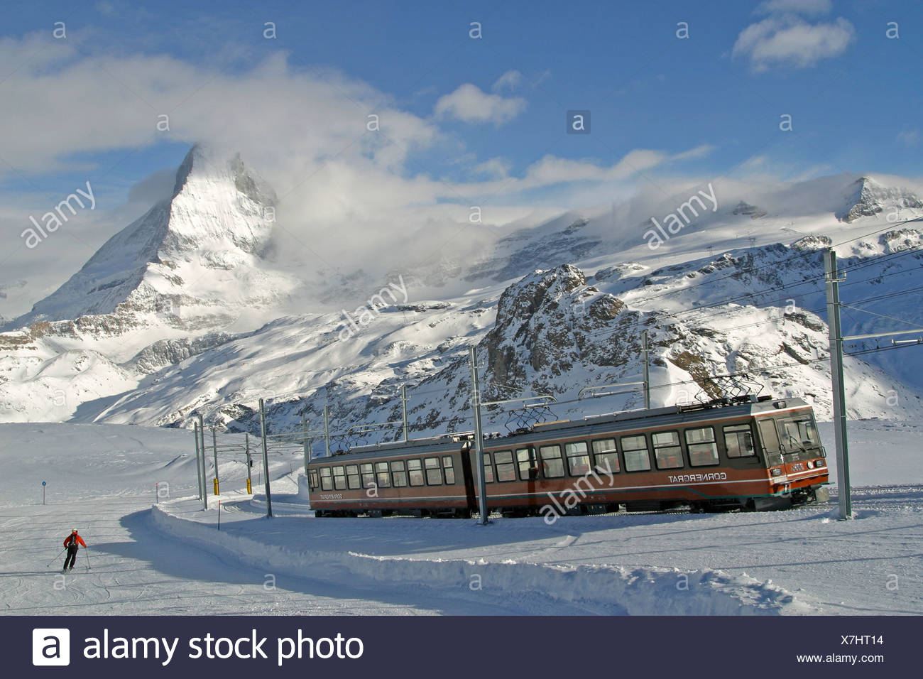 Ski resort Zermatt, Gornergrat-train next to the piste with ...