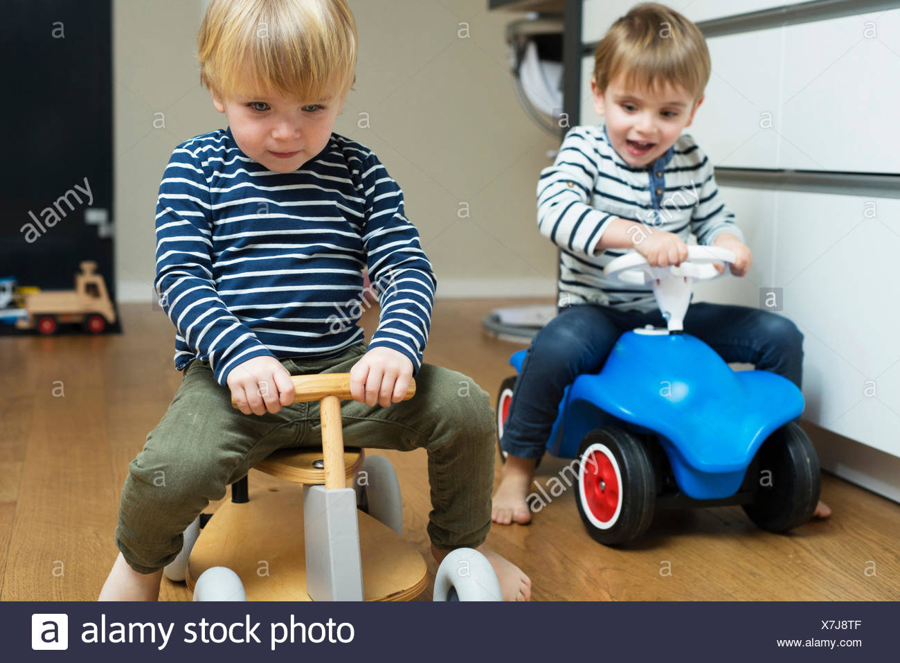 boys playing with cars