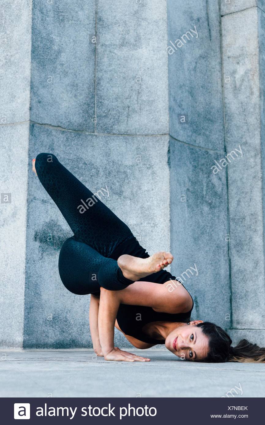 Woman In Arm Balance Pose Eka Pada Koundinyasana Stock Photo Alamy Woman In Arm Balance Pose Eka Pada Koundinyasana Stock Photo Alamy