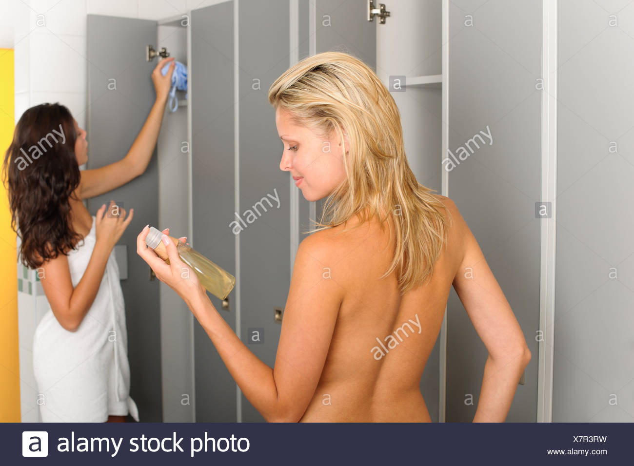 Locker Room Two Sportive Women With Shampoo Stock Photo