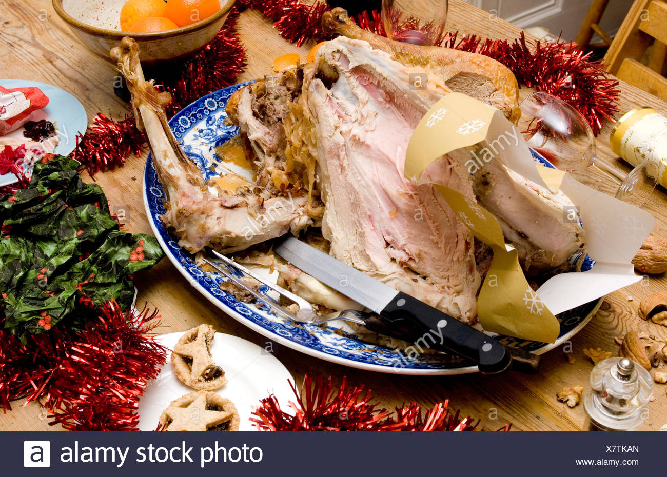 Leftover Turkey On Blue And White Plate Surrounded By Decorations