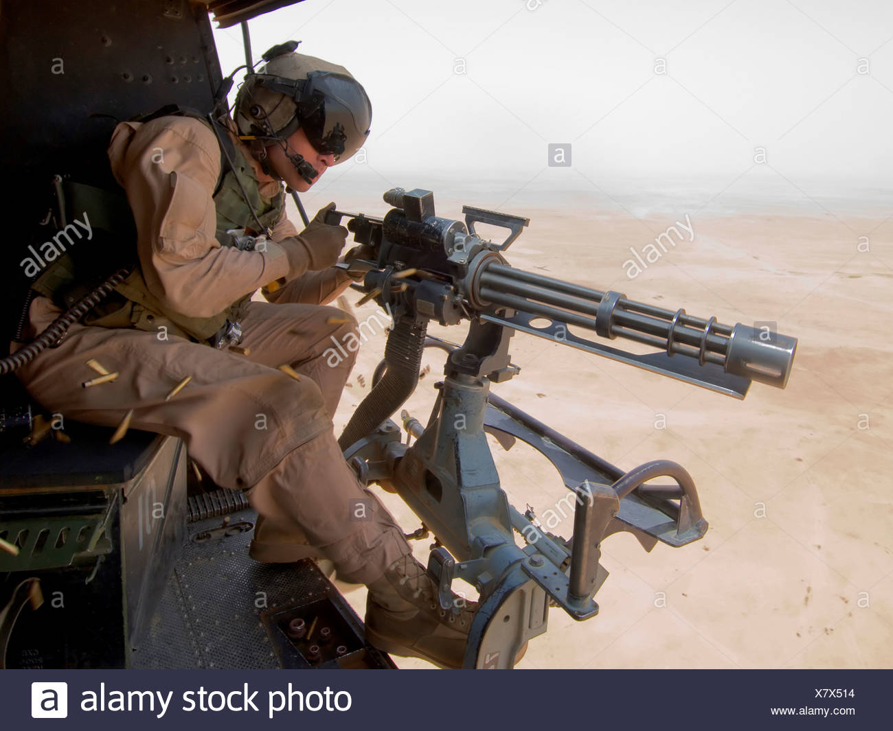 A Us Marine Door Gunner Test Fires His 7 62mm High Speed Rotary