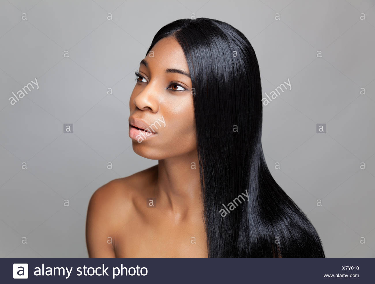 Beautiful Young Black Woman With Long Straight Hair Stock