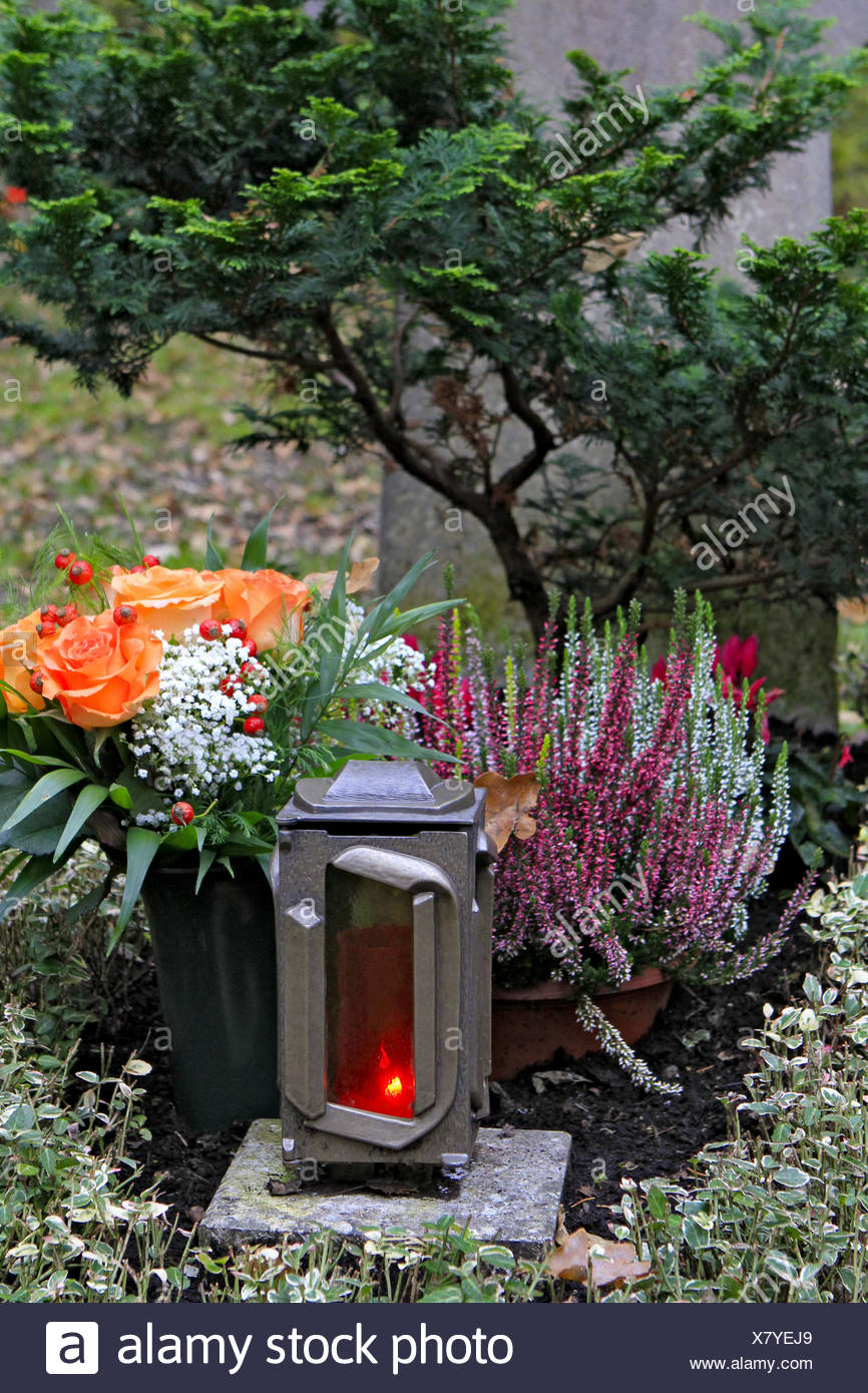 Geschmuecktes Grab auf einem Friedhof an Allerheiligen Stock Photo