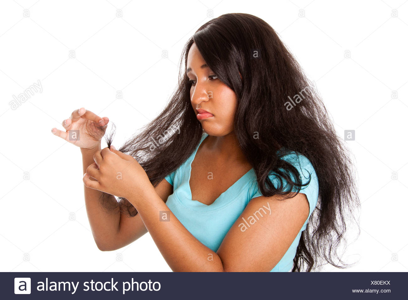 Teenage Girl Sad About Her Frizzy Hair With Split Hair Tips Due To