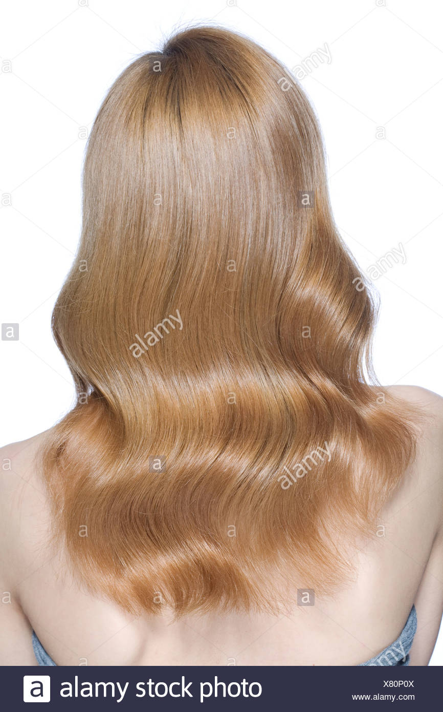 Back View Of Female With Long Wavy Fair Hair Stock Photo