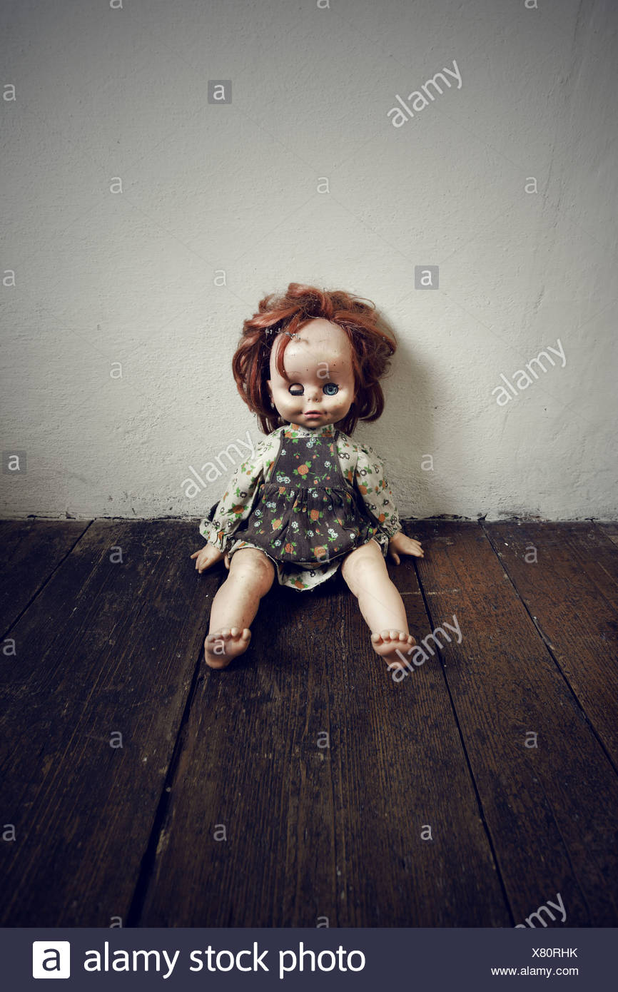 creepy wooden doll