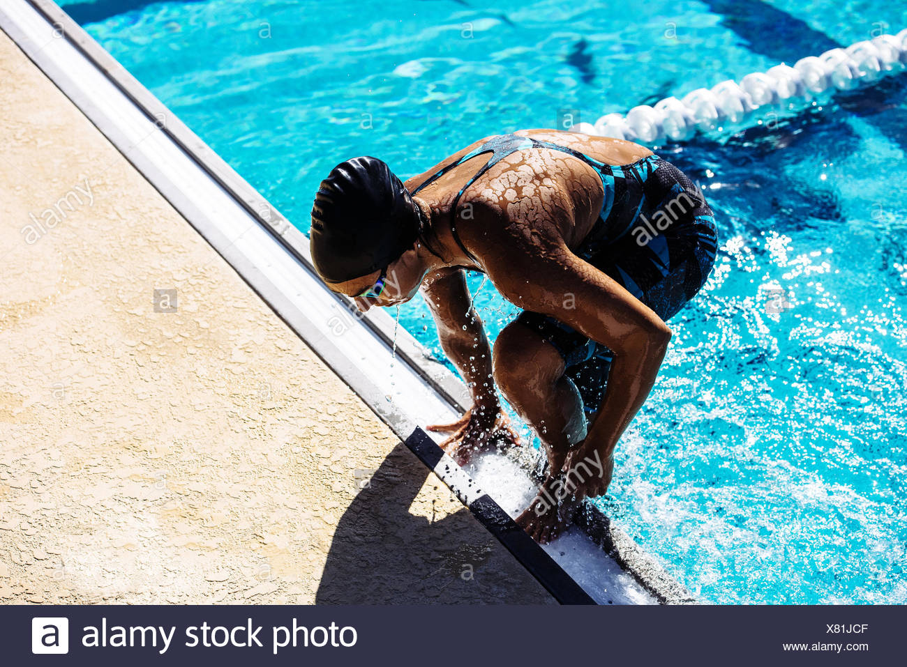 Climbing Out Of Swimming Pool High Resolution Stock Photography and