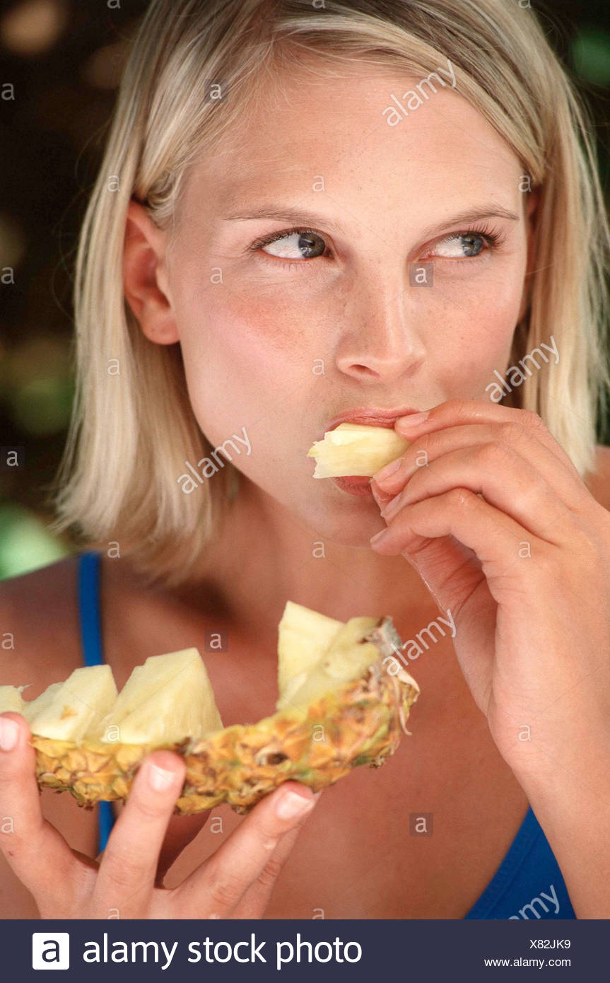 Tanned Female With Chin Length Blonde Hair Wearing Subtle Make Up