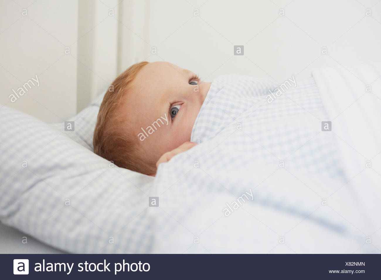 Child Tucked Bed High Resolution Stock Photography and Images Alamy
