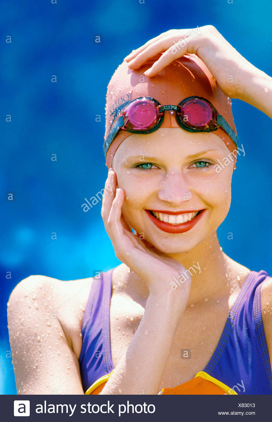 swimming costume and goggles