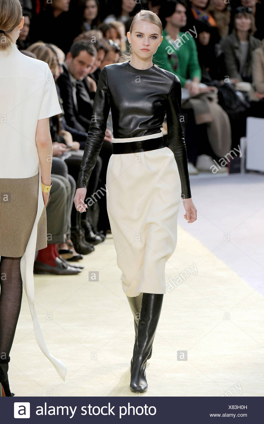 cream skirt black top