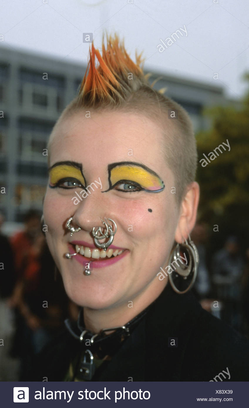 Young female punk with mohican hairstyle and face 