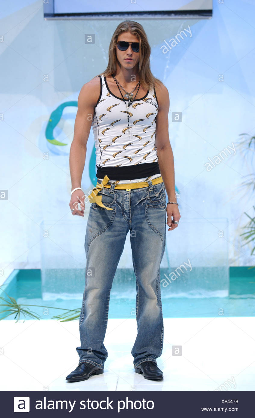 vest and tie with jeans