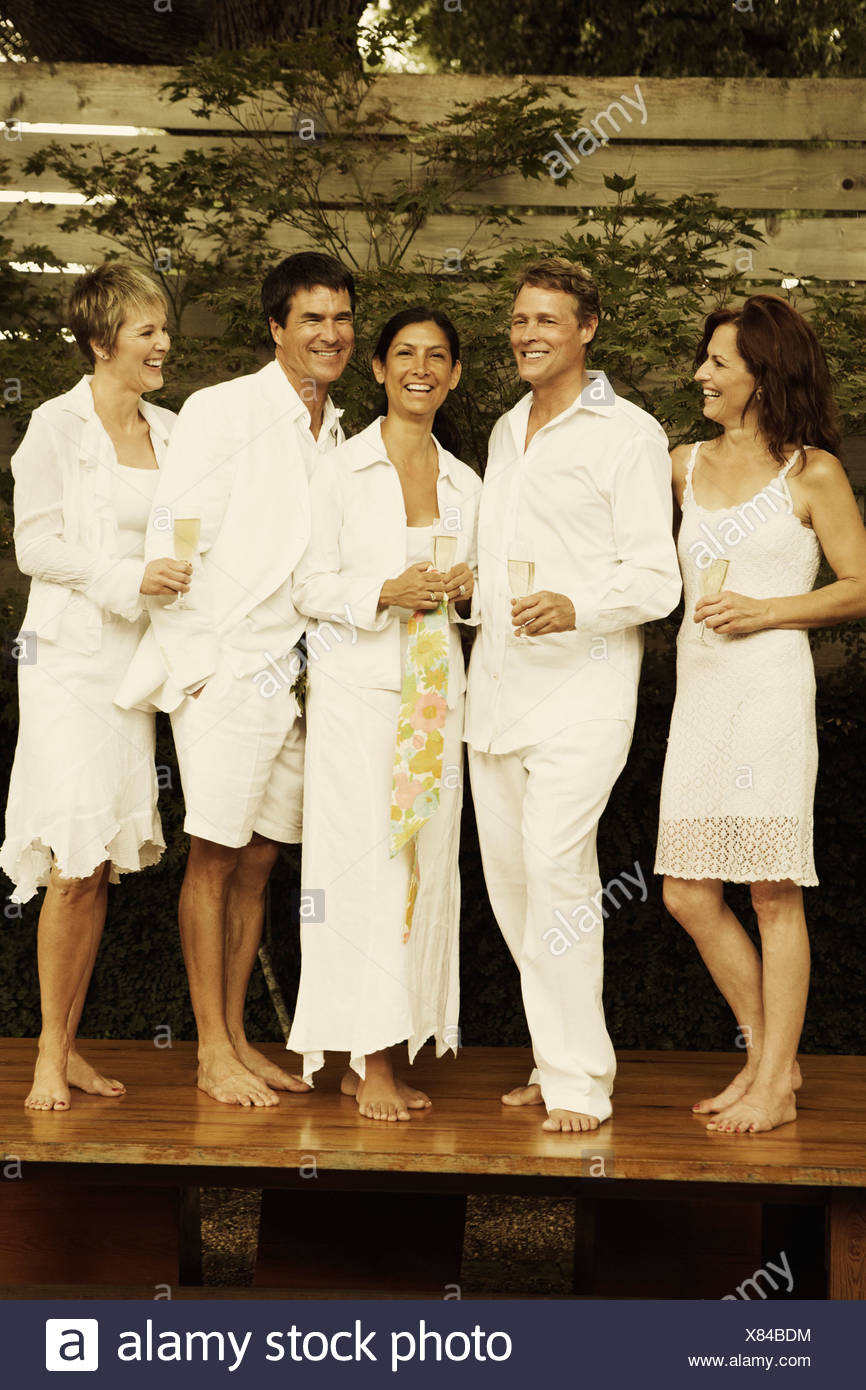 Two Mature Men And Three Mature Women Standing Side By Side On The Table Stock Photo Alamy