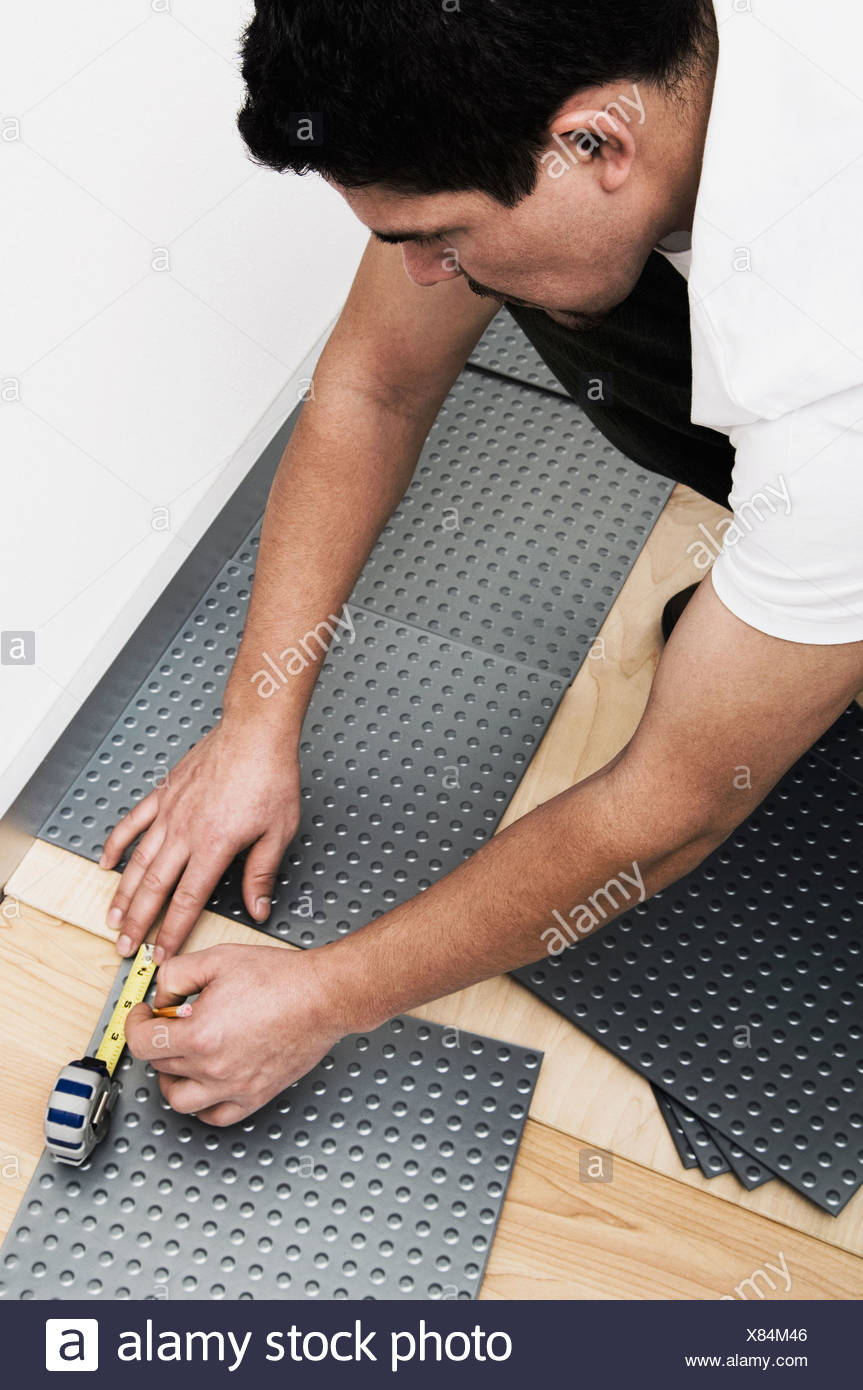 Man Installing Vinyl Tile Stock Photo 280386742 Alamy