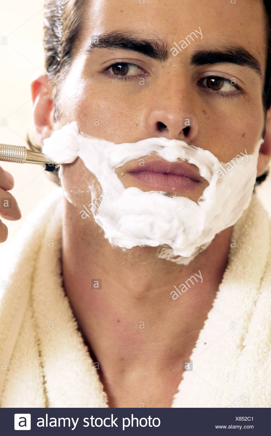 Male Dark Brown Hair White Towel Round Neck Shaving Foam On Face