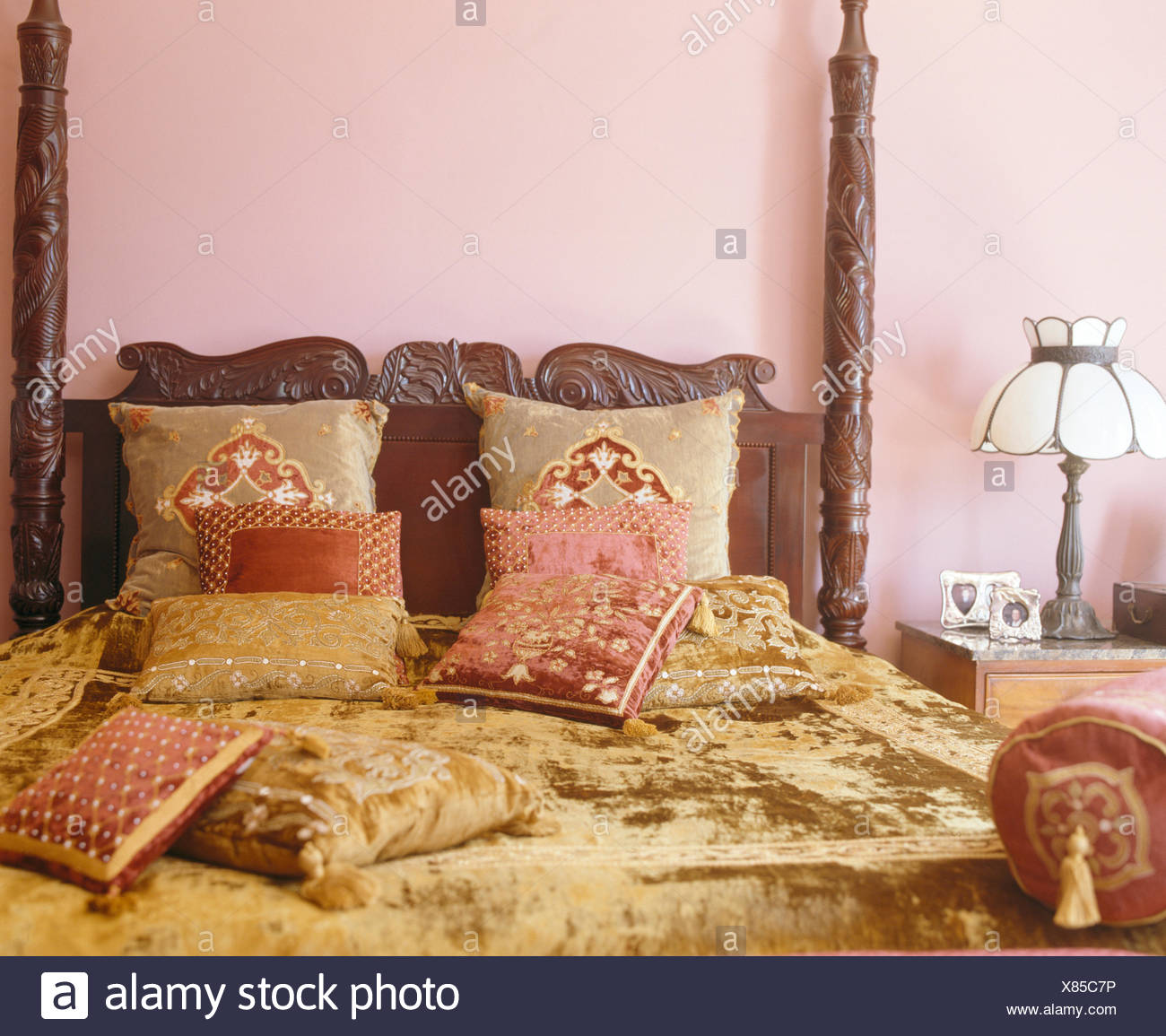 Light Brown Chenille Bedcover And Cushions On Carved Wooden