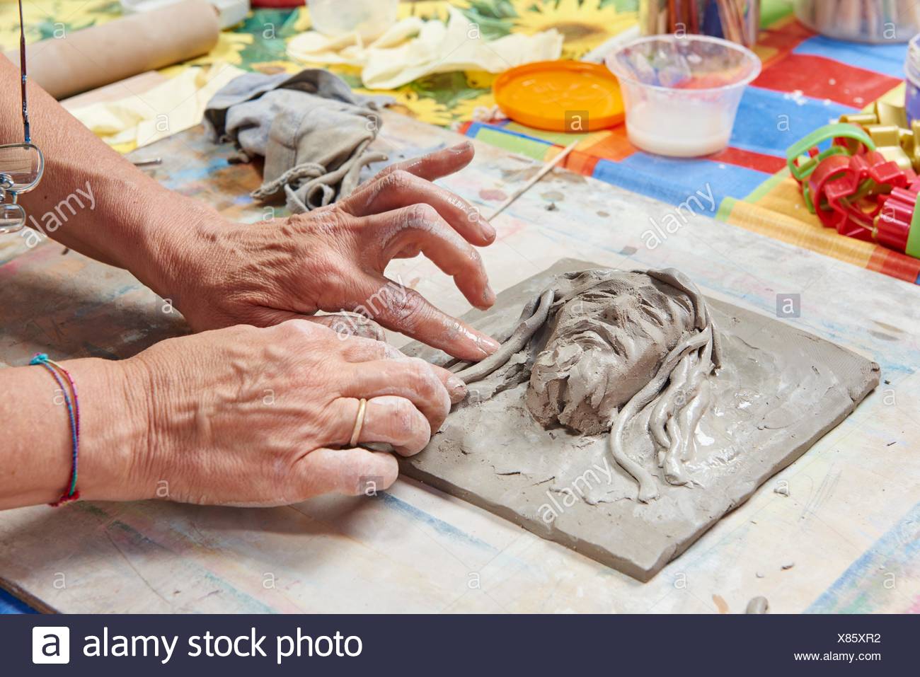 artist modeling clay