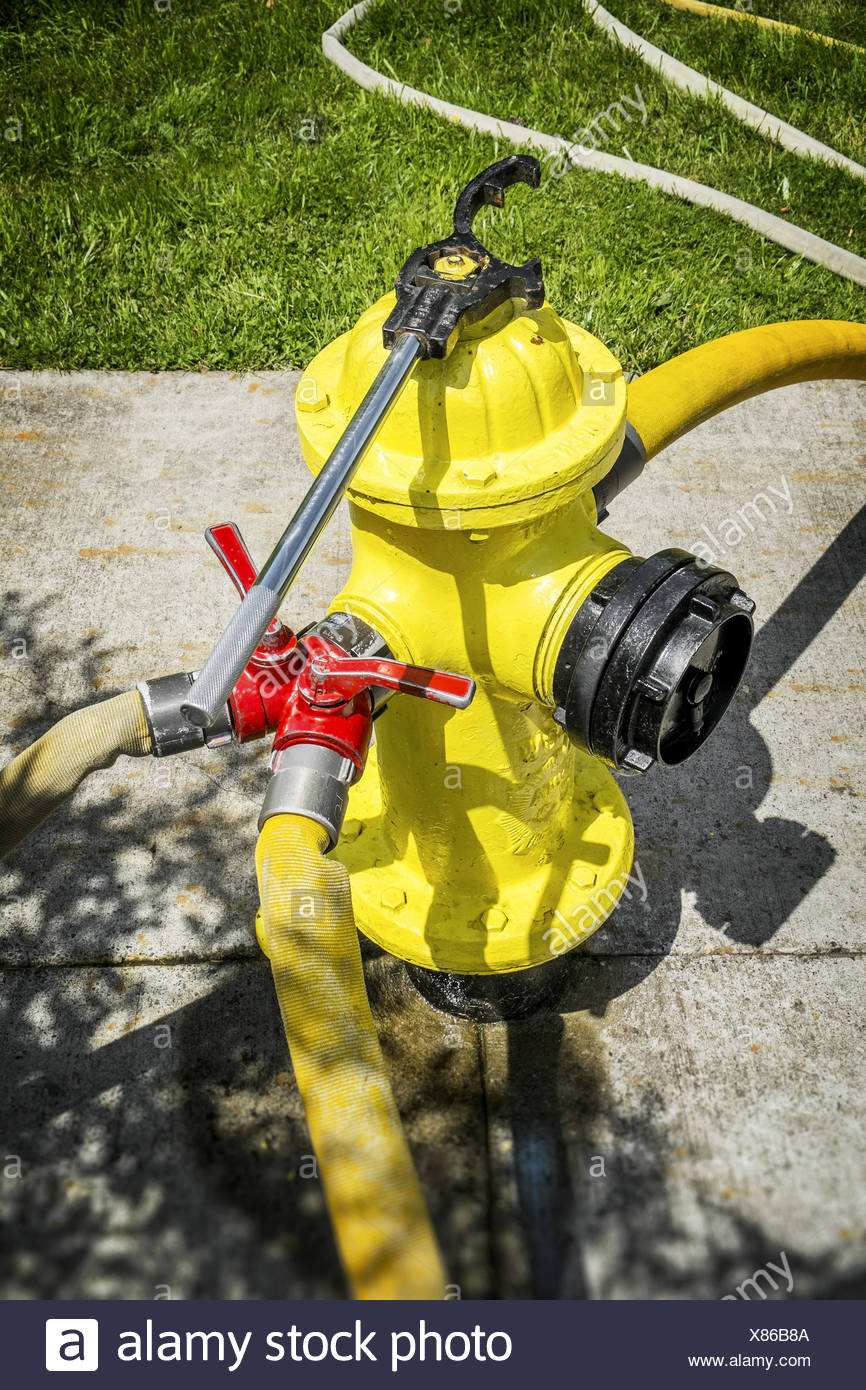 Fire Hose Hydrant High Resolution Stock Photography and Images - Alamy