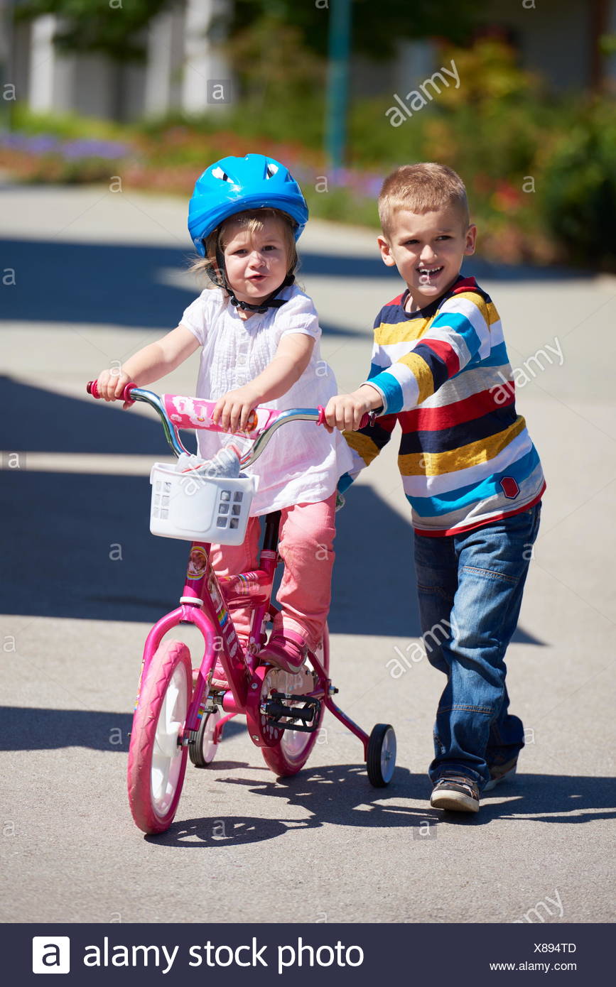 girl boy bike