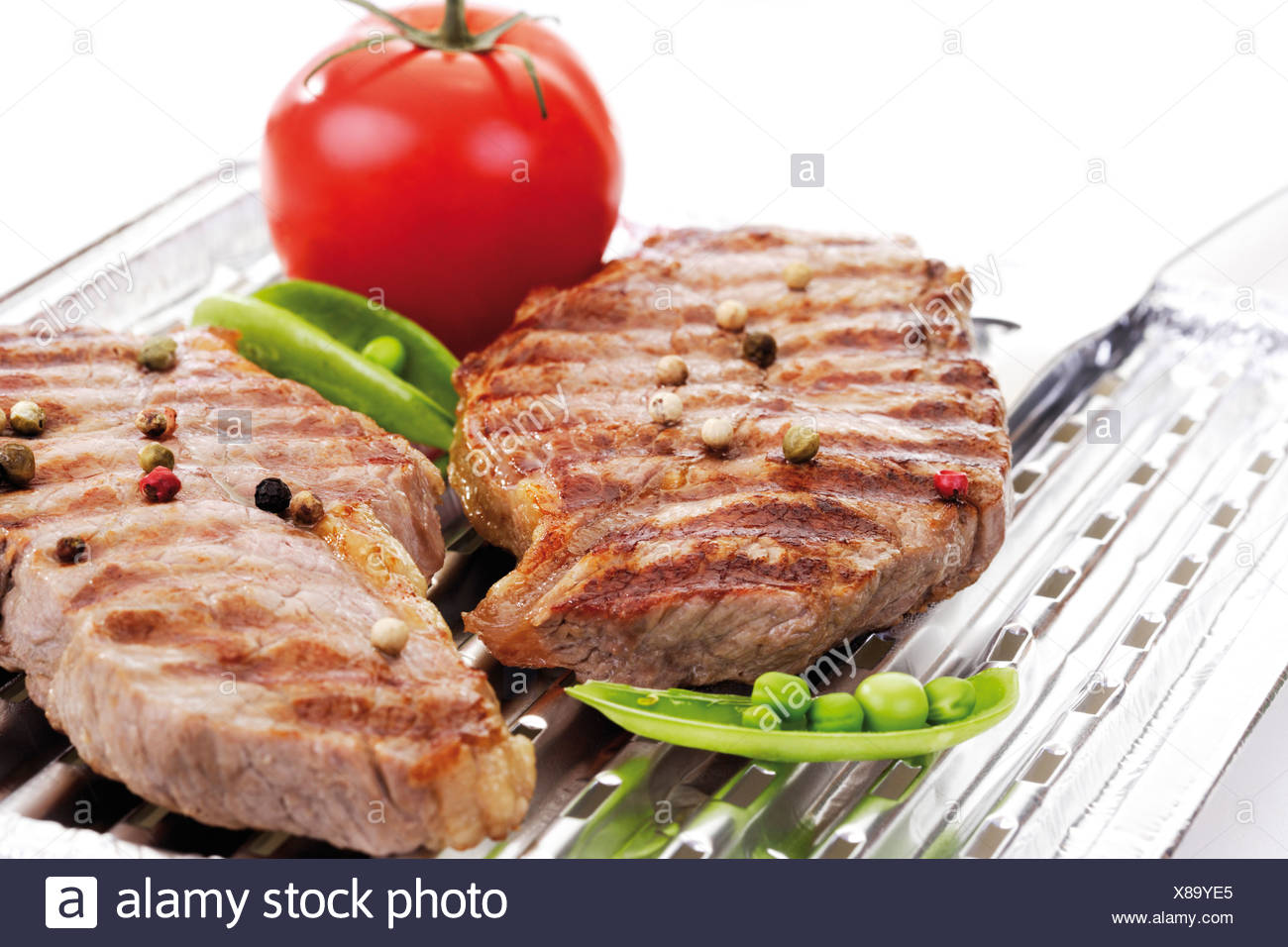 Grilled rumpsteak on aluminium grill pan Stock Photo: 280502269 ...