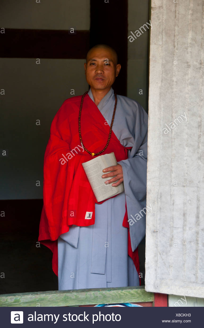 Elderly monk at the Buddhist Pohyon Temple on Mount Myohyang-san, North Korea, Asia Stock Photo