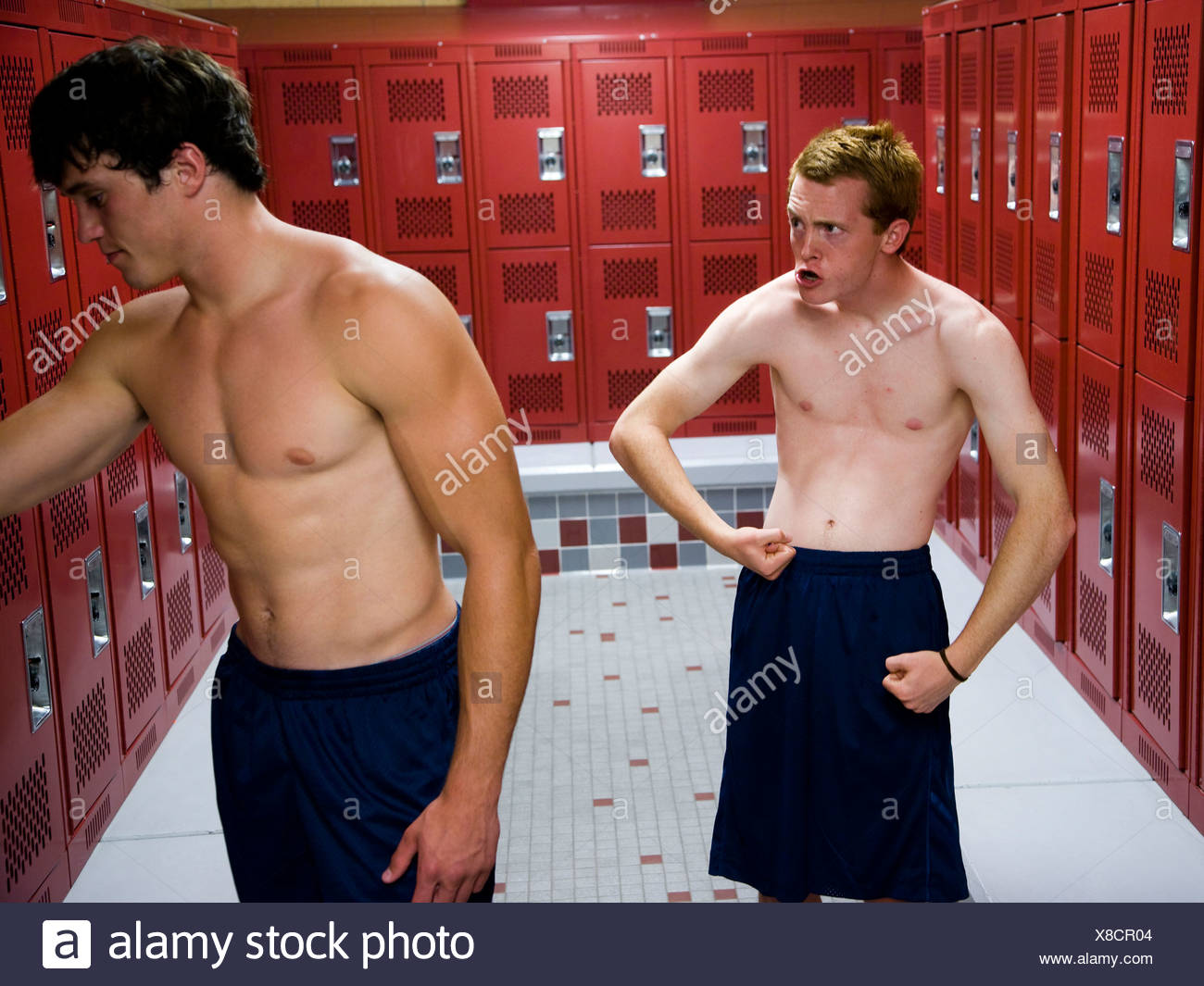 Two High School Students In A Locker Room Stock Photo