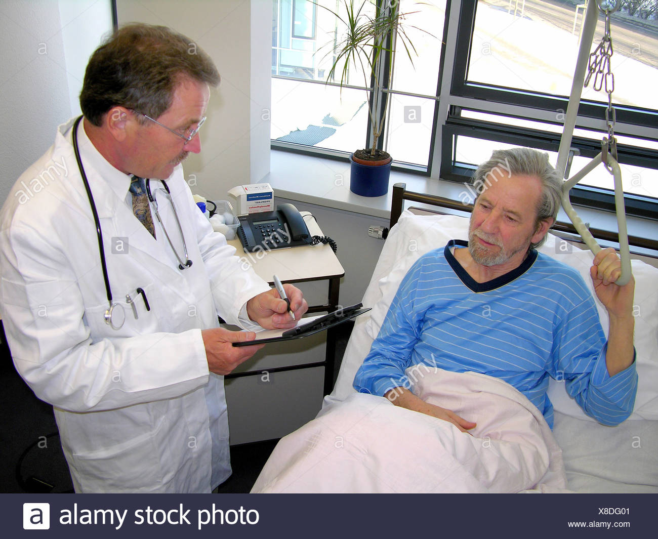 Doctor's visit in the hospital Stock Photo