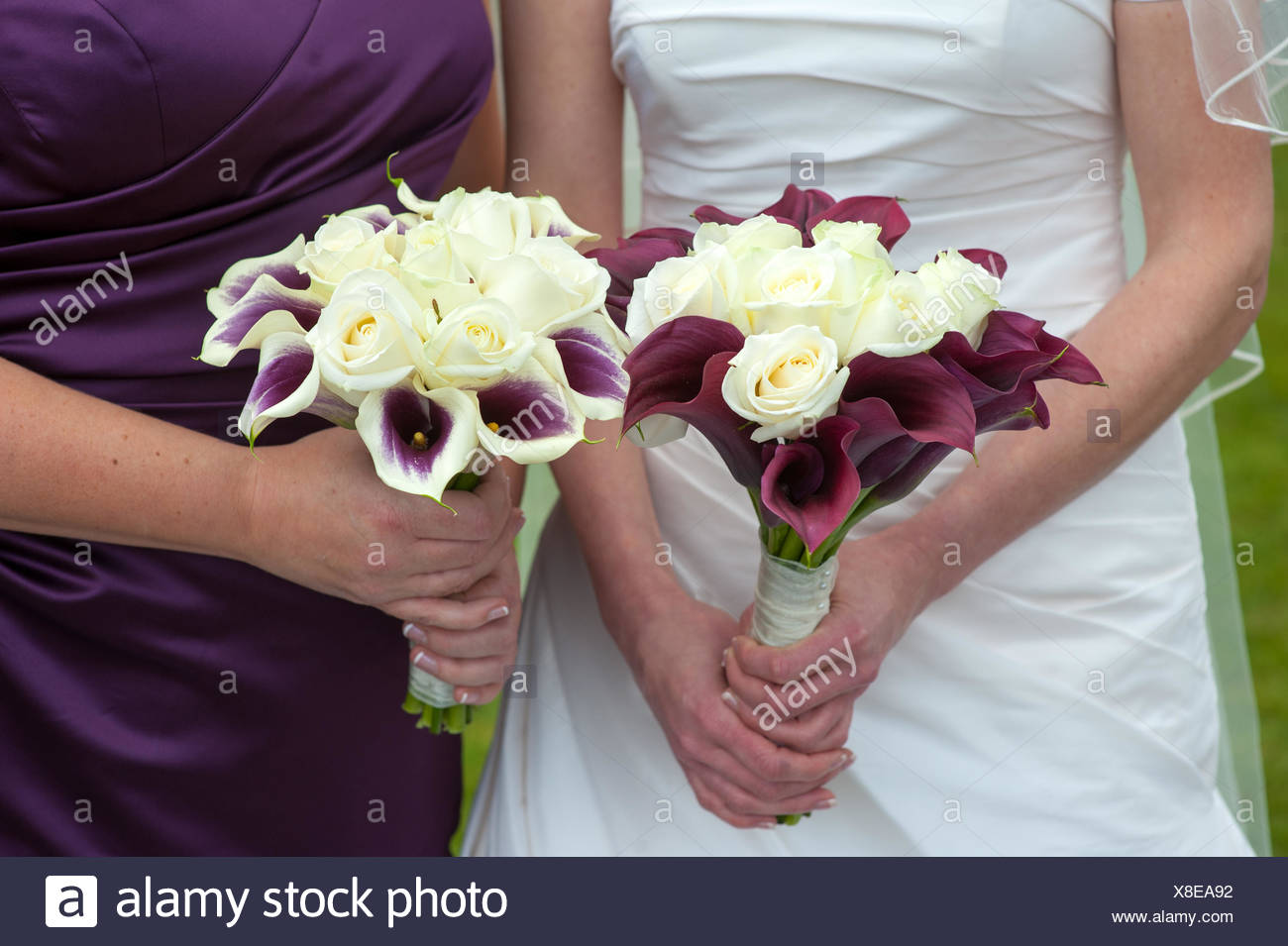 purple and white bridesmaid bouquets