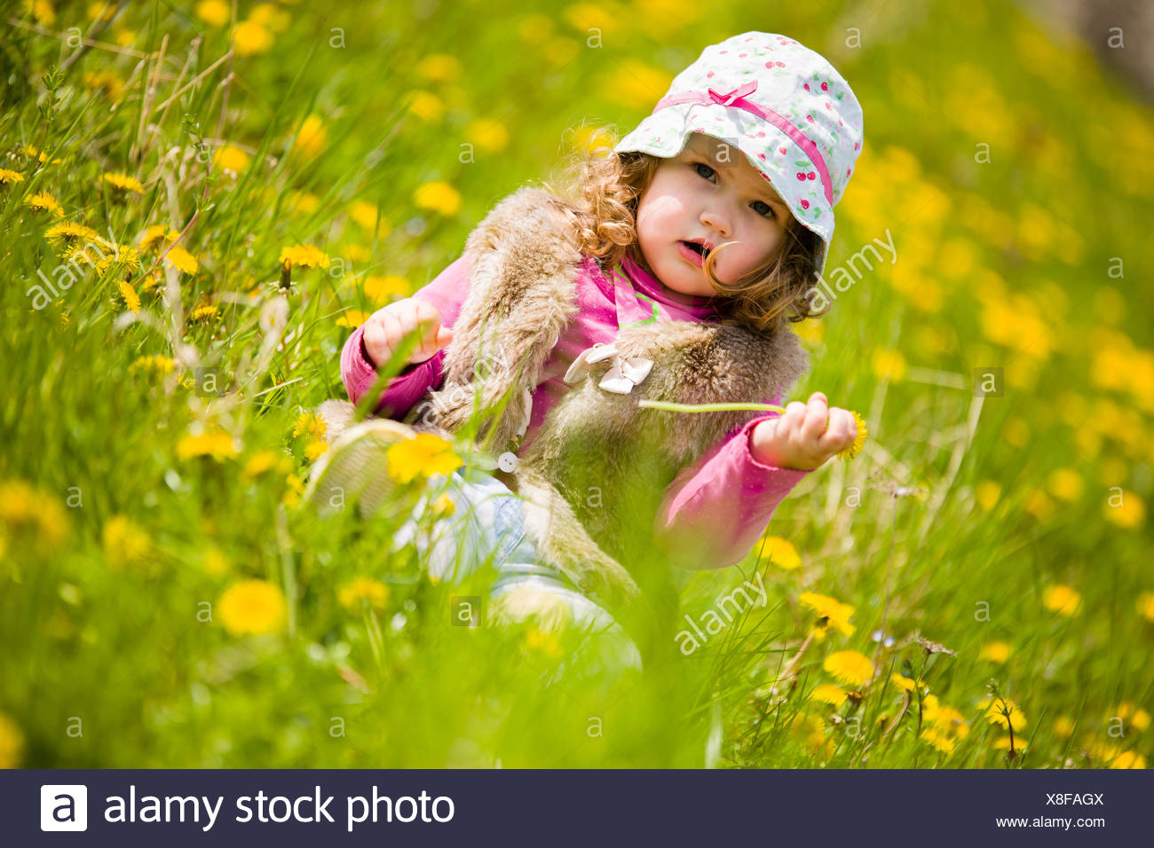 beautiful baby girl with flowers