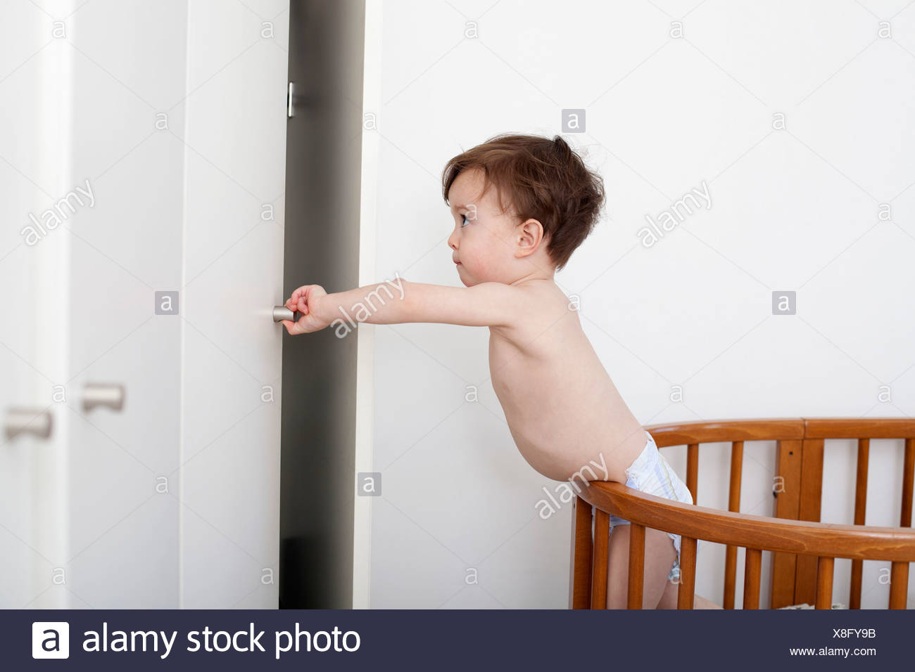 crib with opening door