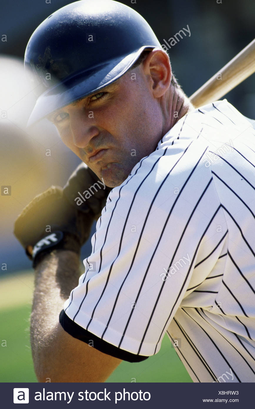 Close Up Of A Baseball Player Swinging A Baseball Bat Stock Photo Alamy