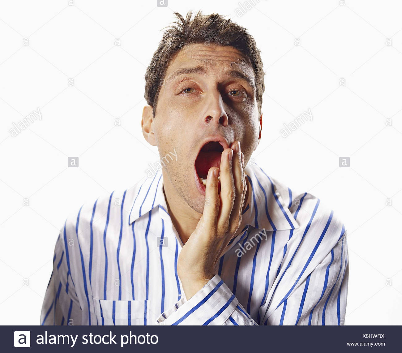 Man Yawning Photos and Premium High Res Pictures - Getty 