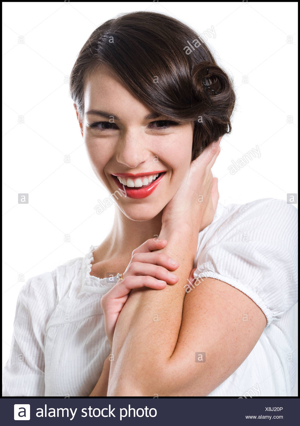 Woman With Her Hair Up In A Classic Hollywood Hairstyle