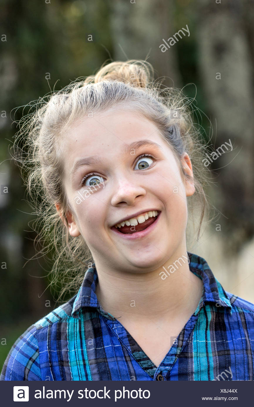 A Young Girl Making Funny Faces Stock Photo Alamy