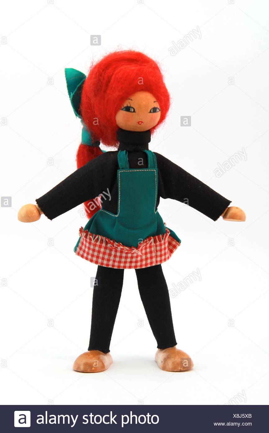 old doll with red hair