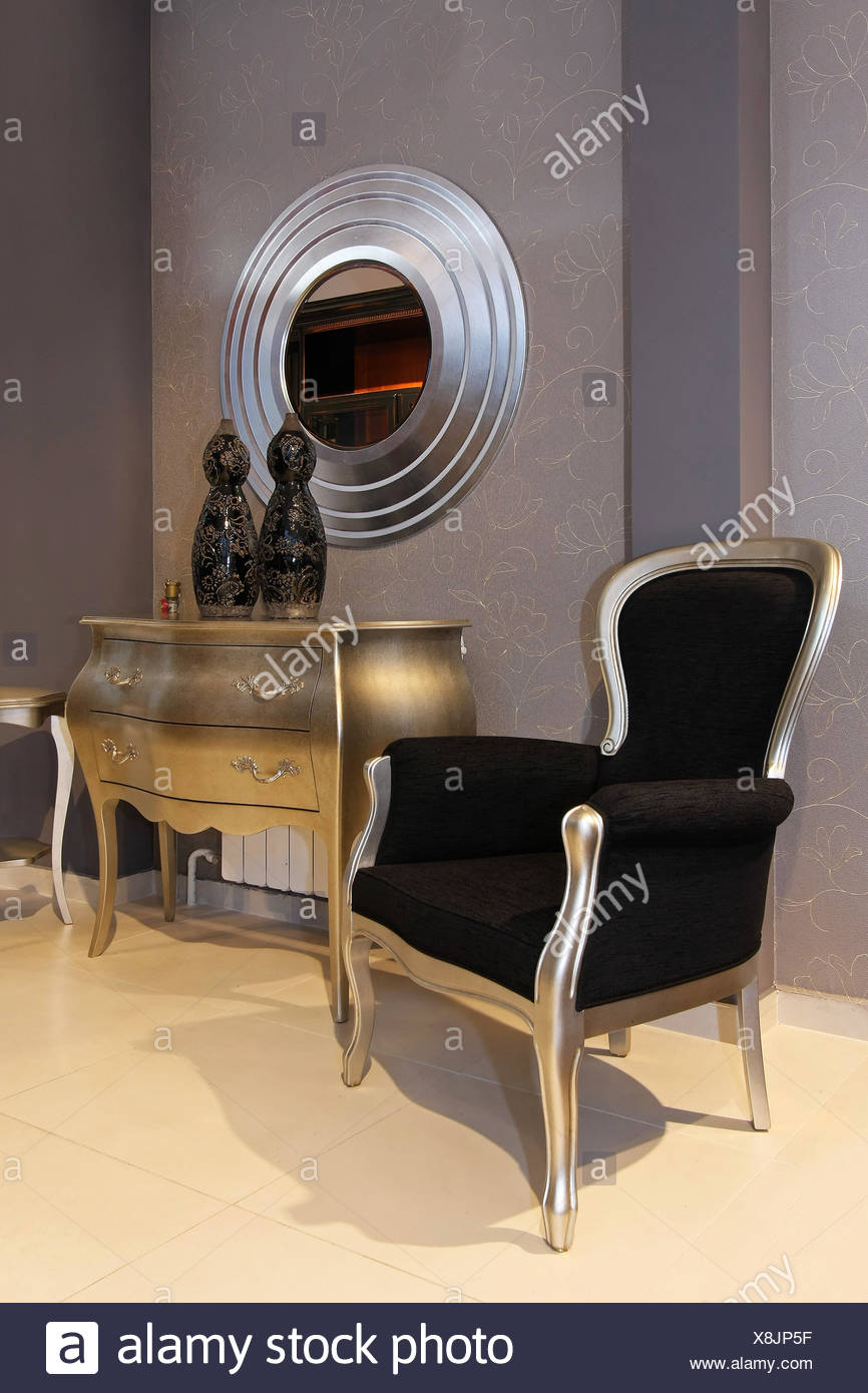 Small Foyer Interior With Silver And Black Furniture Stock Photo