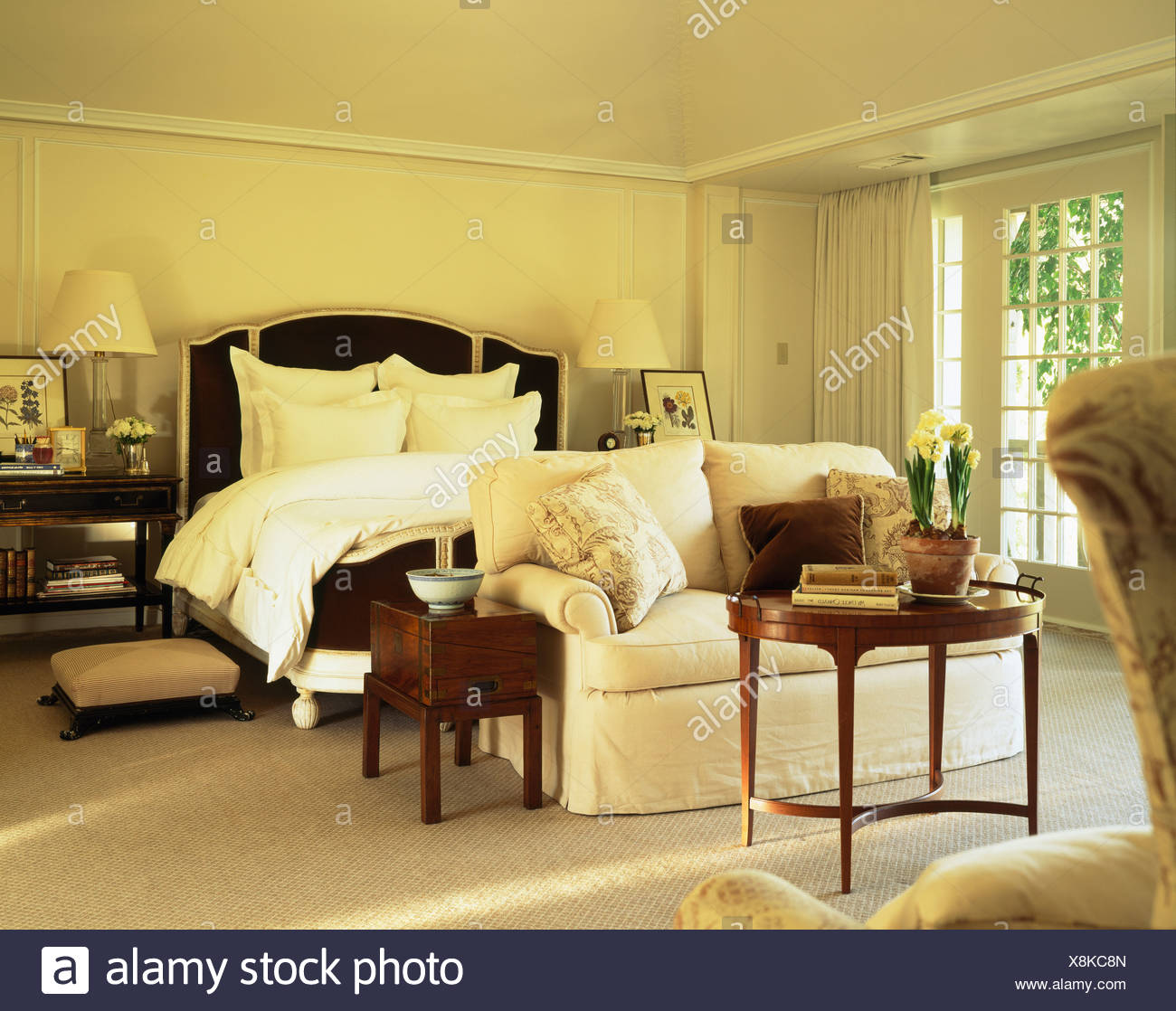 Comfortable White Sofa And Antique Furniture In Traditional